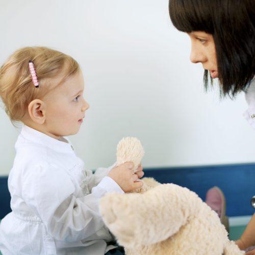 Doctor with baby girl